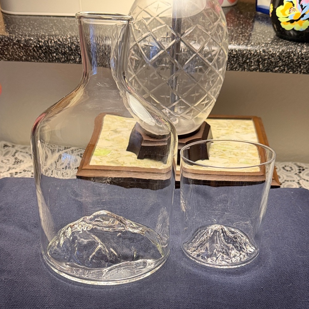 Half Dome Mountain Decanter and Mt. Rainier Whiskey Tumbler in clear crystal.